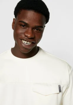 Crewneck - Sudadera - White -Fuerza PUMA 5b9e7b369a2542b09c6275e7e18e4cdb scaled