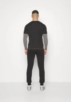 Puma King Pants - Pantalones Deportivos - Black 9 Puma King Pants - Pantalones Deportivos - Black -Fuerza PUMA 5fc4bd583dbf42929fa7a06e289b9c56 scaled