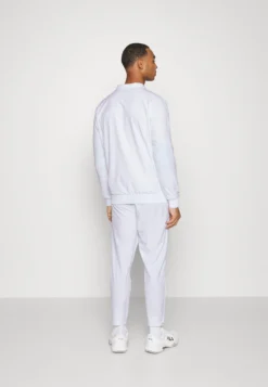 Ellesse Fonzee - Pantalones Montañeros Largos - White -Fuerza PUMA 94d0fdc8da1849c280e3581f871738d8 scaled