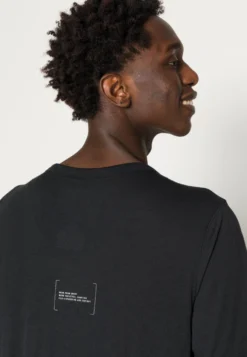 Adidas Sportswear New Fit - Camiseta Estampada - Black 9 Adidas Sportswear New Fit - Camiseta Estampada - Black -Fuerza PUMA dbb0b1a742644af0a78472023e57f230 scaled