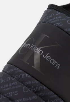 Calvin Klein Jeans Home Shoe Slipper - Pantuflas - Black 15 Calvin Klein Jeans Home Shoe Slipper - Pantuflas - Black -Fuerza PUMA f2fd255956f44ea7b90ff3a06014d2bf scaled